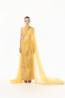 Golden yellow embellished tulle cape gown from Happy Clothing, featuring intricate detailing and flowing fabric.