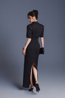 Keira Tong zipper peplum maxi dress featuring a fitted waist, stylish peplum detail, and full-length design.