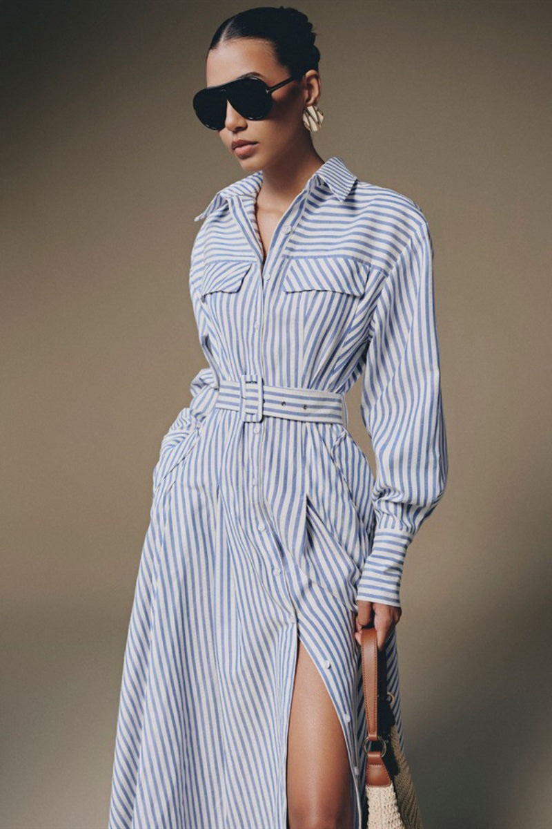 Keira Tong Thera Stripped Shirt Dress, a stylish maxi dress with a relaxed fit and striped pattern, displayed on a hanger.