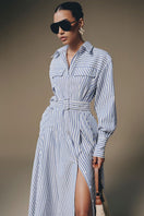 Keira Tong Thera Stripped Shirt Dress, a stylish maxi dress with a relaxed fit and vertical striped pattern, shown on a model.