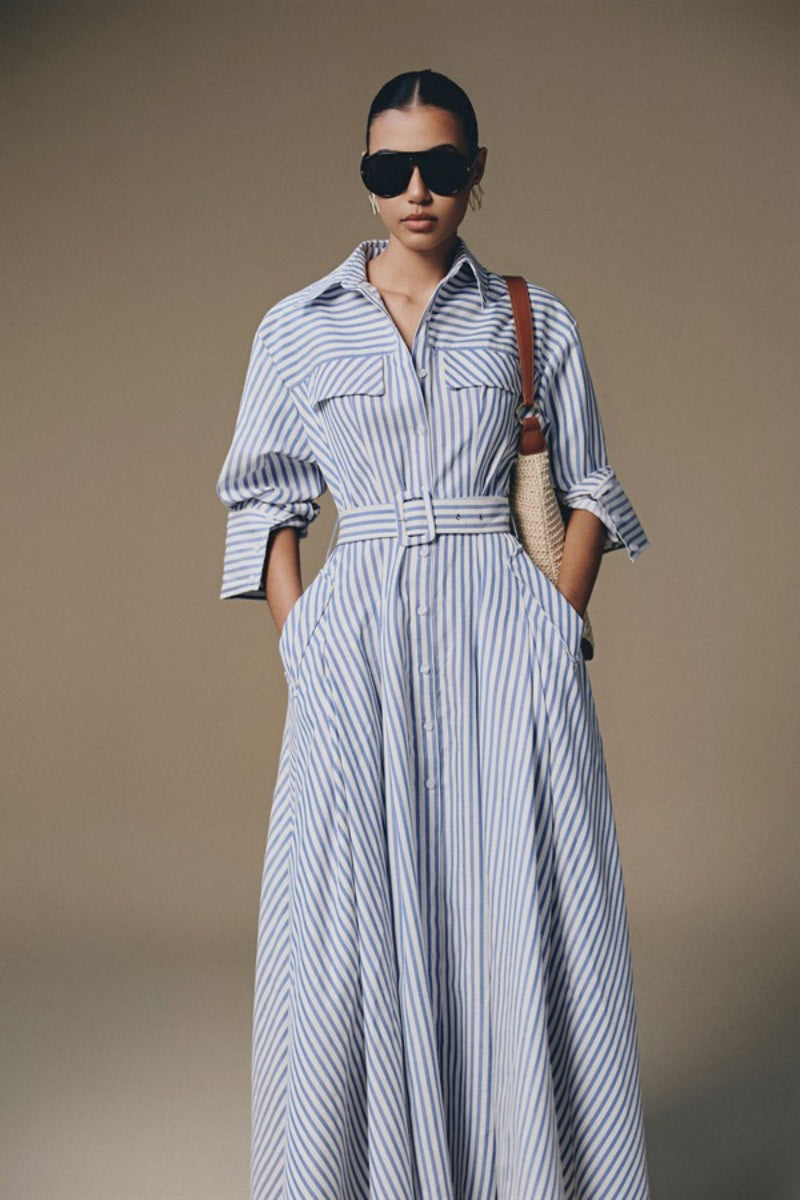 Keira Tong Thera Stripped Maxi Dress featuring a relaxed fit, sleeveless design, and casual striped pattern.