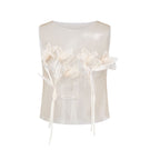 Arti Apparel TELLUS TOP, stylish women's blouse with a relaxed fit, featuring a soft fabric and modern design.