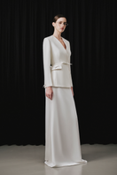 White Plan hygien set co-ords featuring matching top and pants in a sleek, modern design.