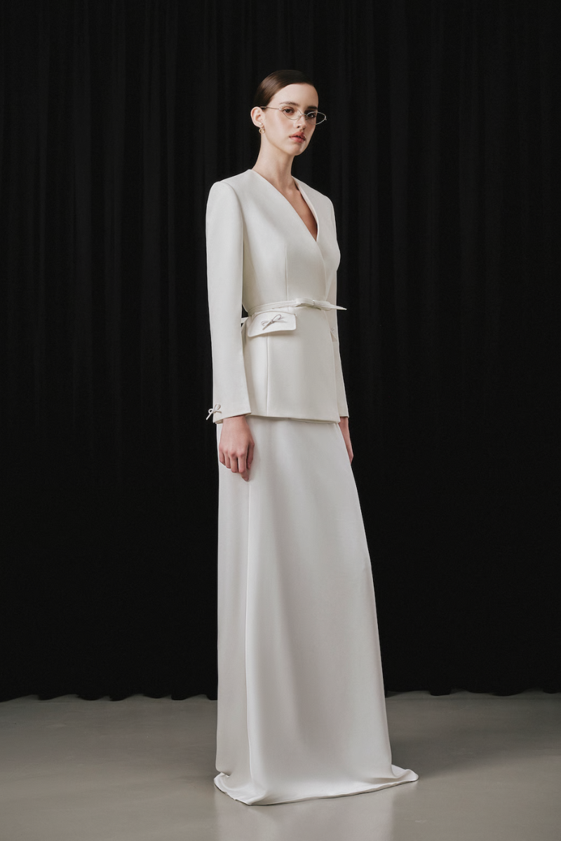 White Plan hygien set co-ords featuring matching top and pants in a sleek, modern design.