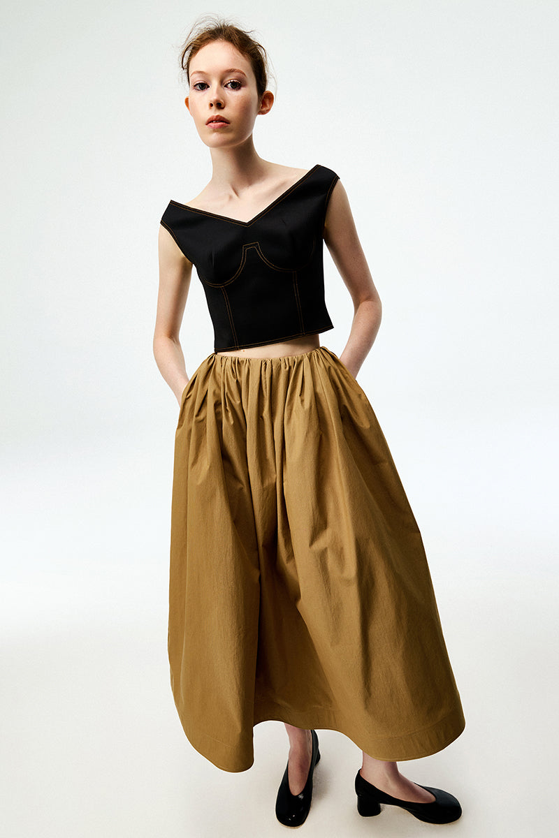 Black Chictopia bustier top with lace details, fitted style, and adjustable straps, perfect for stylish evening wear.