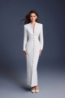 Keira Tong folded button maxi dress displayed on a hanger, showcasing its elegant design and fabric details.