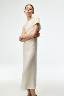 Chictopia ivory crepe maxi dress displayed on a hanger with flowing fabric and elegant design, perfect for formal occasions