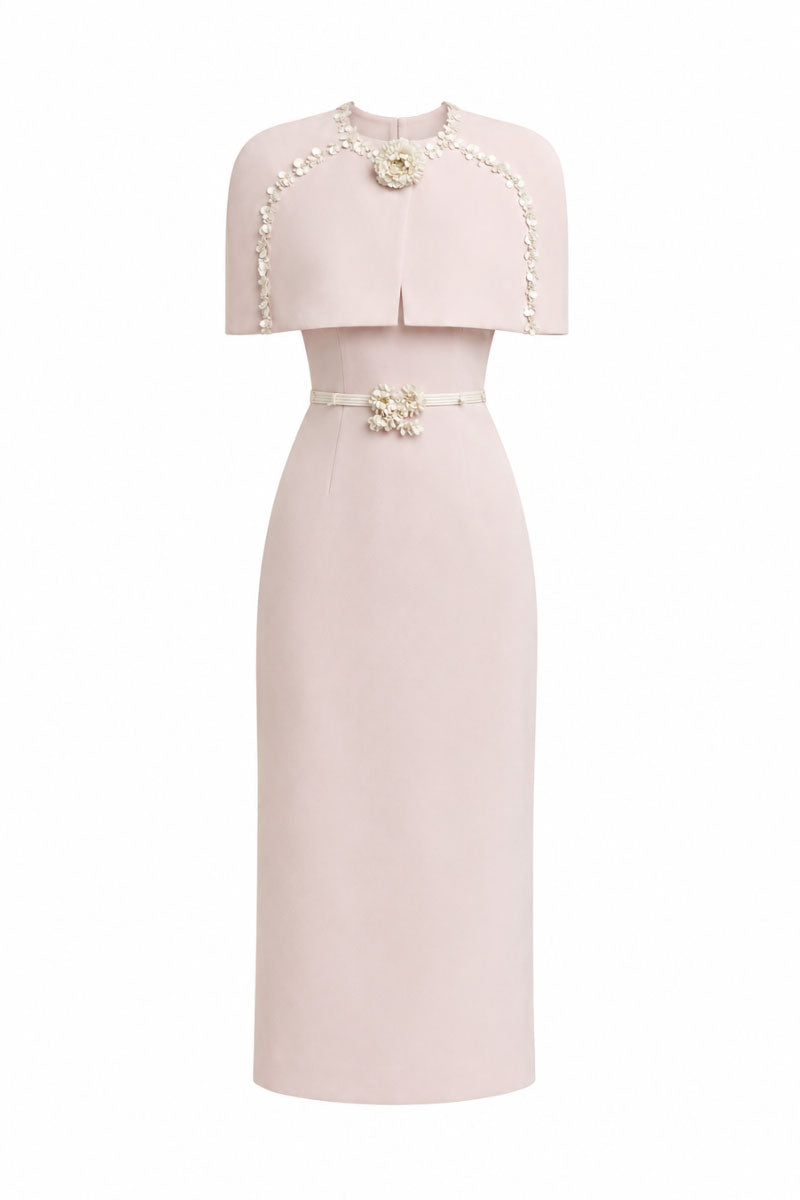 White Plan Mara pink midi dress displayed on a hanger, showcasing its elegant design and vibrant color.