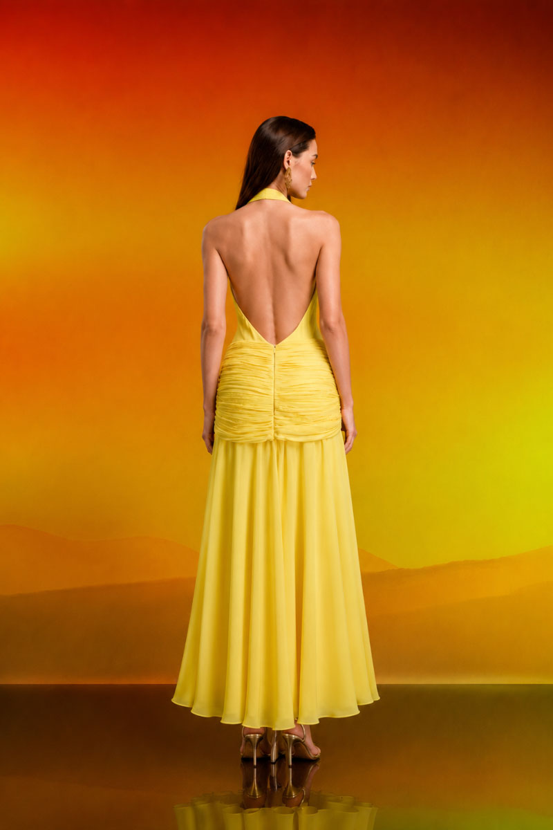 CEM Luxe Twist Mini gown in elegant fabric, featuring a fitted silhouette and stylish design, displayed on a mannequin.