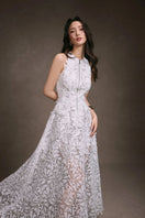 Keira Tong floral lace maxi dress with intricate lace details, flowing silhouette, and floral pattern for elegant summer wear.
