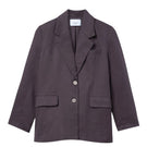 Relaxed single-breasted blazer by Dāl the Label, shown in a tailored fit with lapels and front pockets on a neutral background.