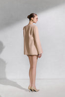 Arti Apparel TELLUS TOP in a stylish, lightweight fabric with a relaxed fit, displayed on a neutral background.