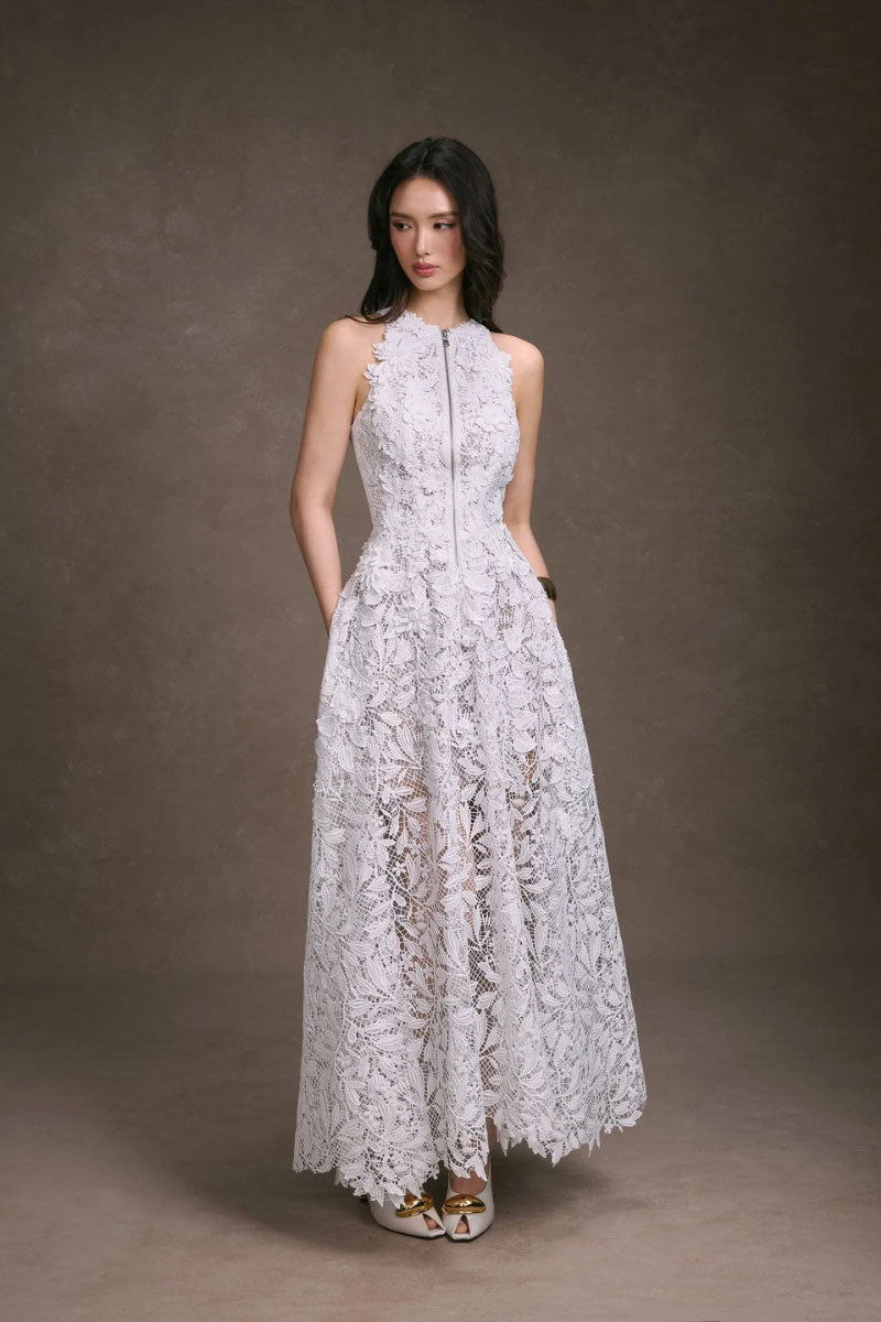 Elegant floral lace maxi dress by KEIRA TONG featuring intricate lace details and a flowing silhouette.