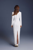 Keira Tong folded buttons maxi dress displayed flat, showcasing its elegant design and button details on soft fabric.