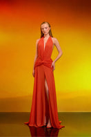 Elegant draped chiffon gown by CEM featuring flowing fabric and a sophisticated design, perfect for formal occasions.