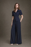 Keira Tong stripe wide-leg pants displayed on a model, featuring a relaxed fit and bold stripe pattern for a stylish look.