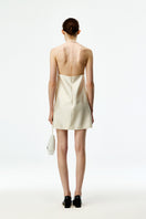 Ivory silk wool mini dress by Chictopia featuring a stylish, fitted silhouette and elegant design for versatile wear.