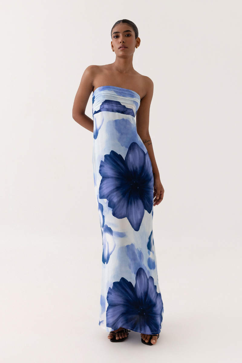 Summer Away COMO Bloom maxi dress featuring a floral pattern, flowing fabric, and sleeveless design for a stylish summer look.