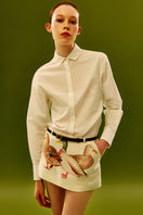 Chictopia ivory poplin shirt displayed with a classic collar and long sleeves, perfect for casual or professional wear.