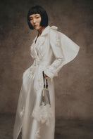 Ivory embroidered trench coat by White Plan, stylish outerwear with detailed embroidery, perfect for layered winter or spring fashion.
