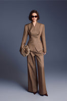 Keira Tong minimal wide-leg pants in neutral fabric, showcasing a relaxed fit and high-waisted design on a model.