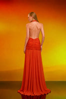 CEM draped chiffon gown in soft pastel color with flowing fabric and elegant design, perfect for formal occasions.