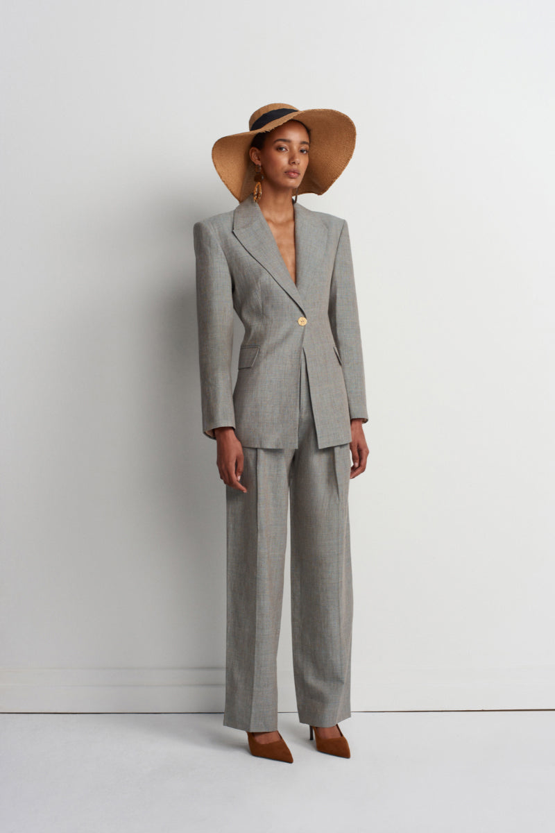 Green melange linen blazer by Acaria Studio, stylish jacket with tailored fit and natural fabric texture.