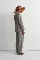 Green melange linen blazer by Acaria Studio, stylish men's jacket with tailored fit and classic lapel, front button closure.