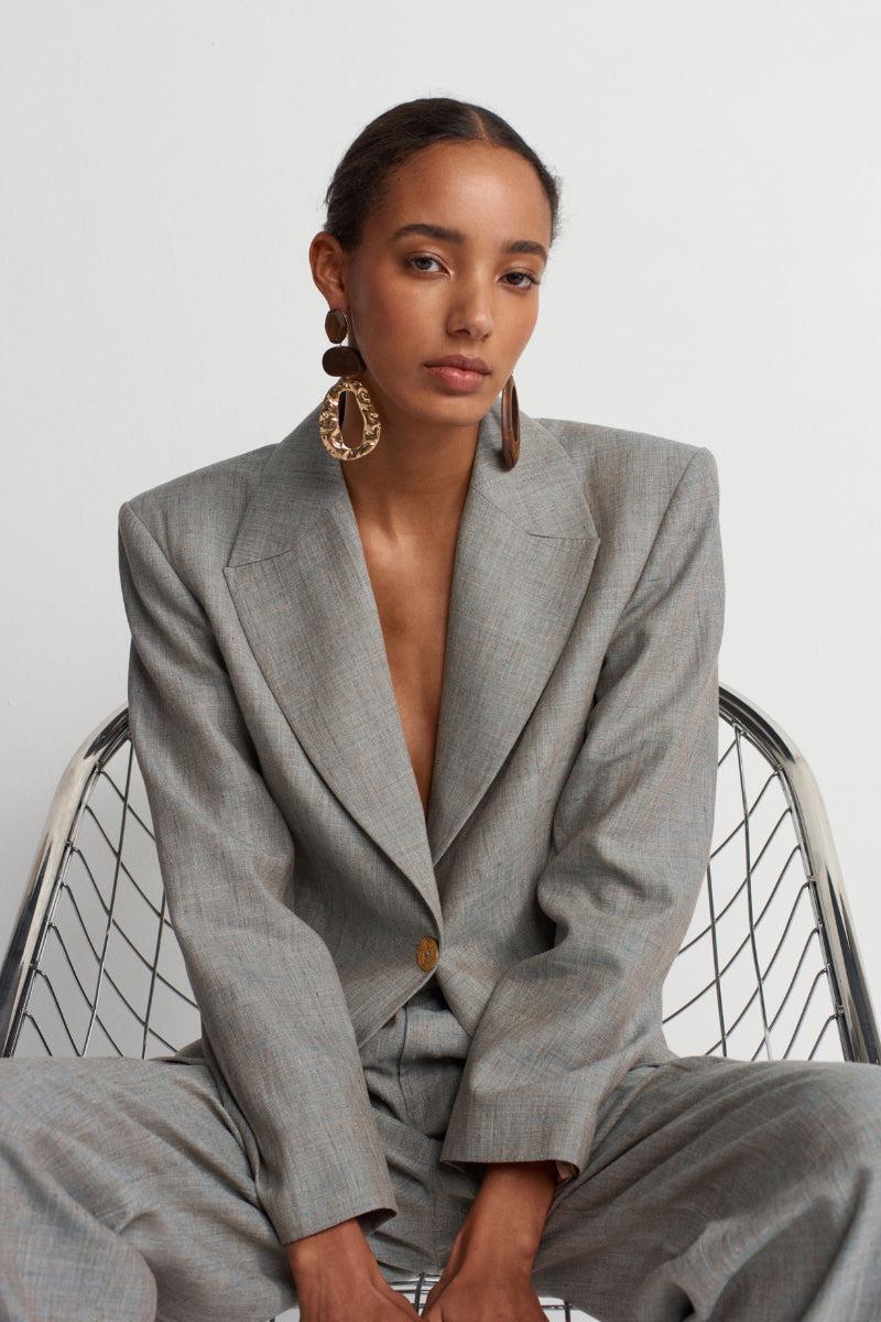 Green melange linen blazer by Acaria Studio, stylish jacket with tailored fit and classic lapel design.