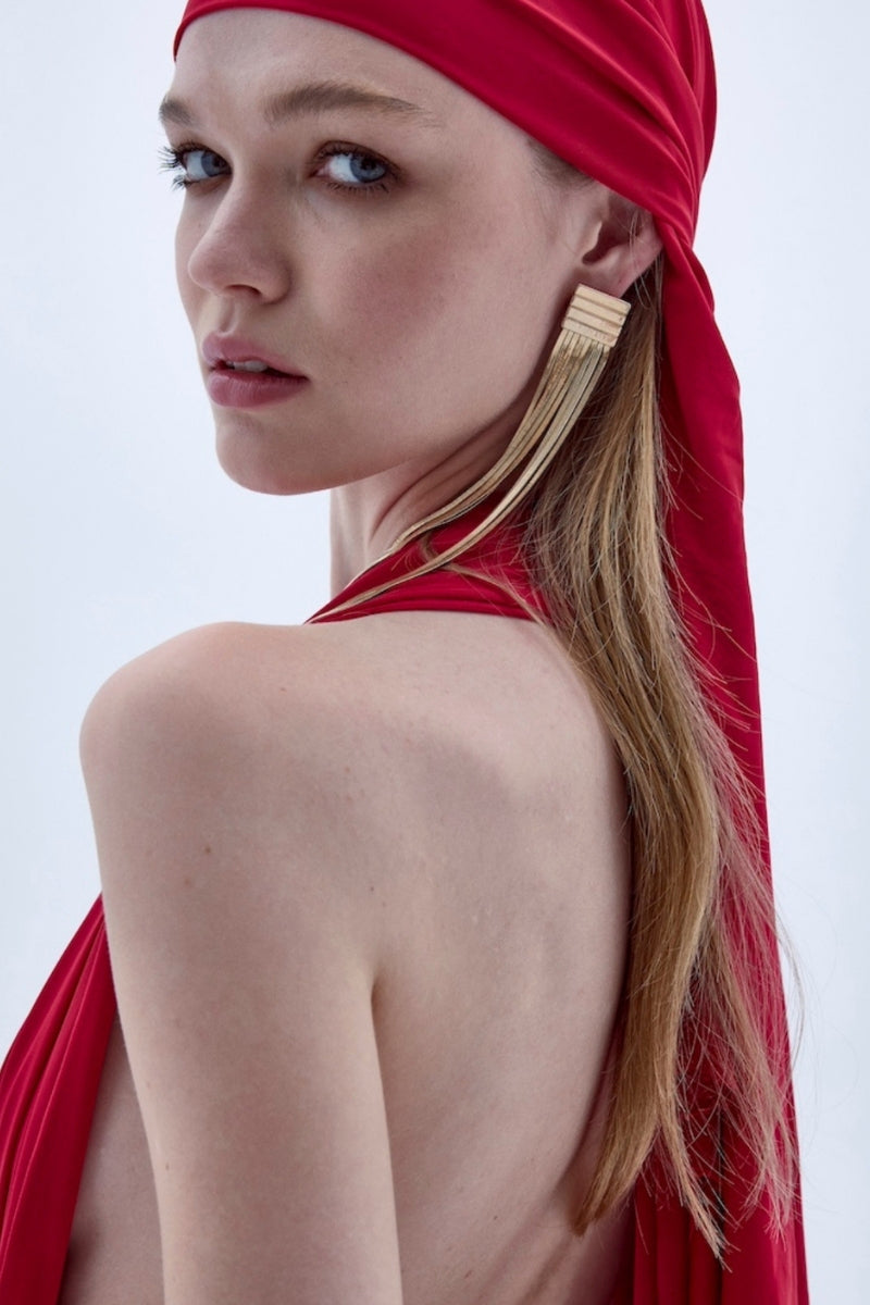 Nazlı Ceren INES long red maxi jersey dress displayed on a model with flowing fabric and elegant design.