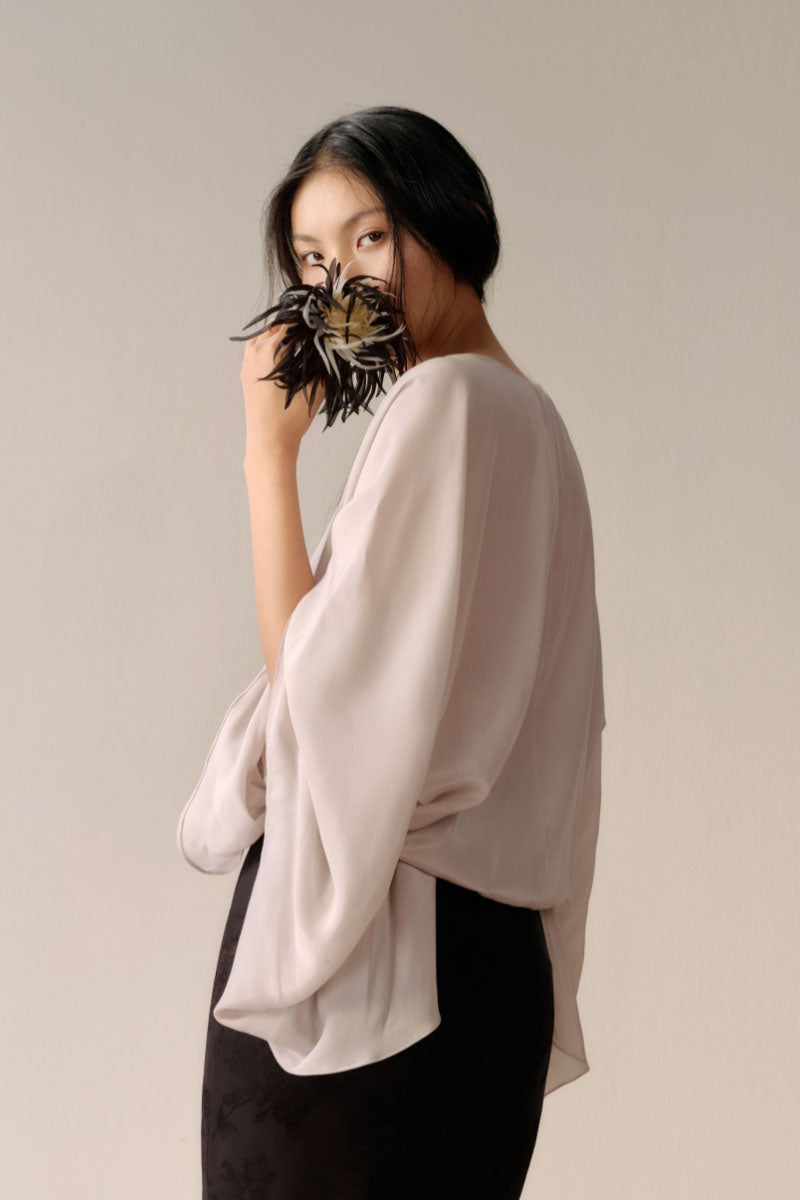 Lecia gentle long sleeve shirt in ivory, soft fabric with a classic fit, displayed on a hanger against a plain background.