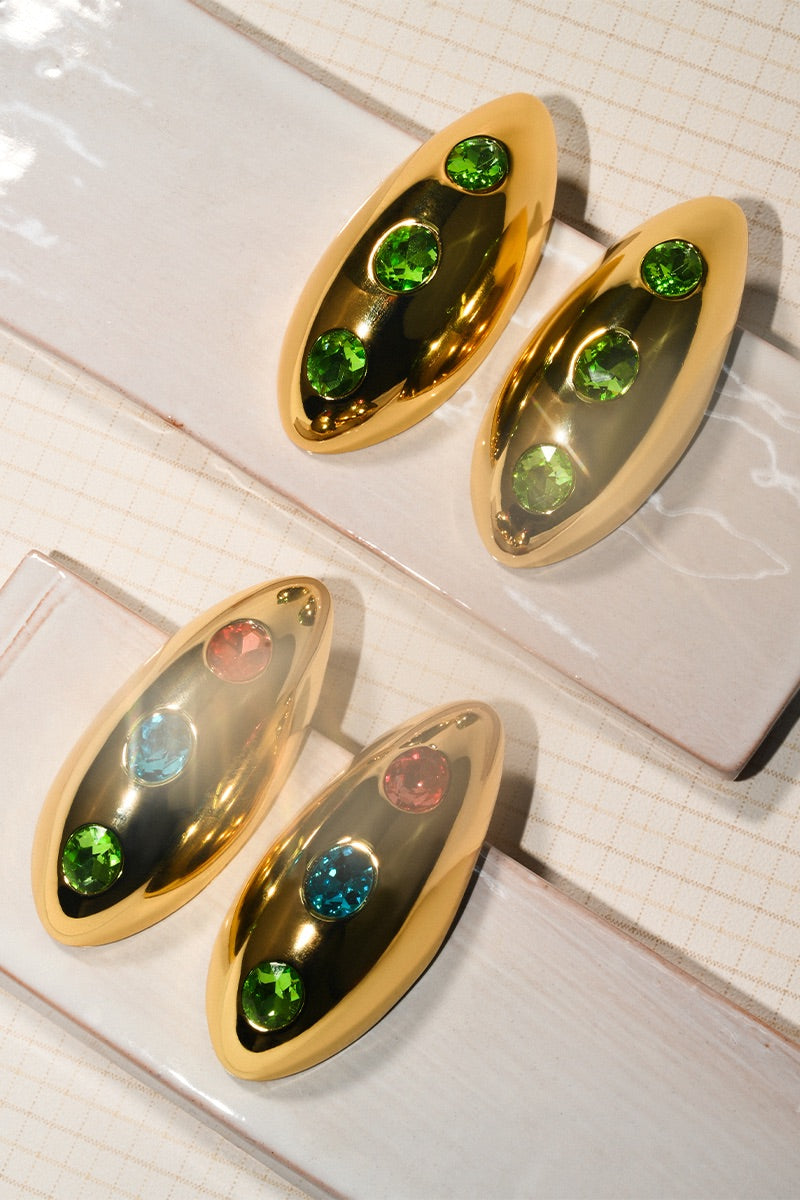 Liya Ocean Eye Green Earrings featuring vibrant green gemstone earrings with a sleek, modern design for women.