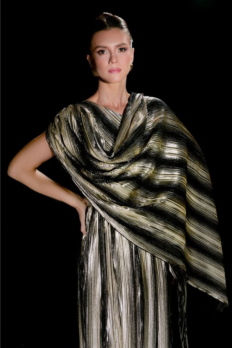 Nur Karaata maxi gown from the SR NUR KARAATA X CULT MIA collection, featuring flowing fabric and elegant design.