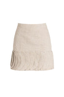 Ana + Maria Tatti Sand Mini Skirt featuring a stylish, fitted design and neutral beige color, perfect for casual or dressy outfits.