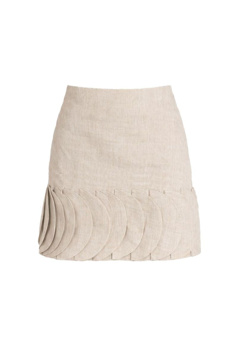 Ana + Maria Tatti Sand Mini Skirt featuring a stylish, fitted design and neutral beige color, perfect for casual or dressy outfits.