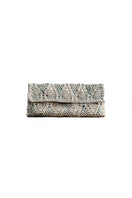 White gold pineapple clutch by VERDI with turquoise accents, featuring a sleek, stylish design perfect for evening accessories.