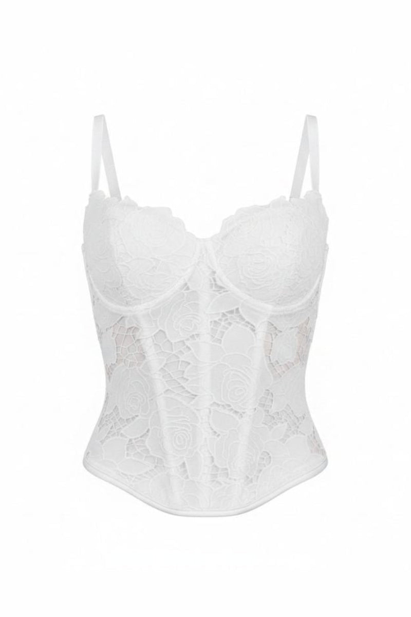 White corset top from Ellipse Lingerie, featuring intricate lace details and a fitted design, perfect for stylish layered looks.