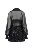 Edana black silk pleated co-ord set by 21Six, featuring a stylish top and matching skirt with elegant pleats.