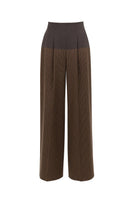 Two-tone waist pleated trousers by Lecia, showcasing the stylish design and tailored fit in a close-up view.