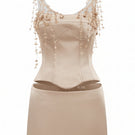 Beige silk taffeta co-ord set featuring the Delilah top and Marielle skirt by 21Six, shown on a neutral background.