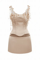 Beige silk taffeta co-ord set featuring the Delilah top and Marielle skirt by 21Six, shown on a neutral background.