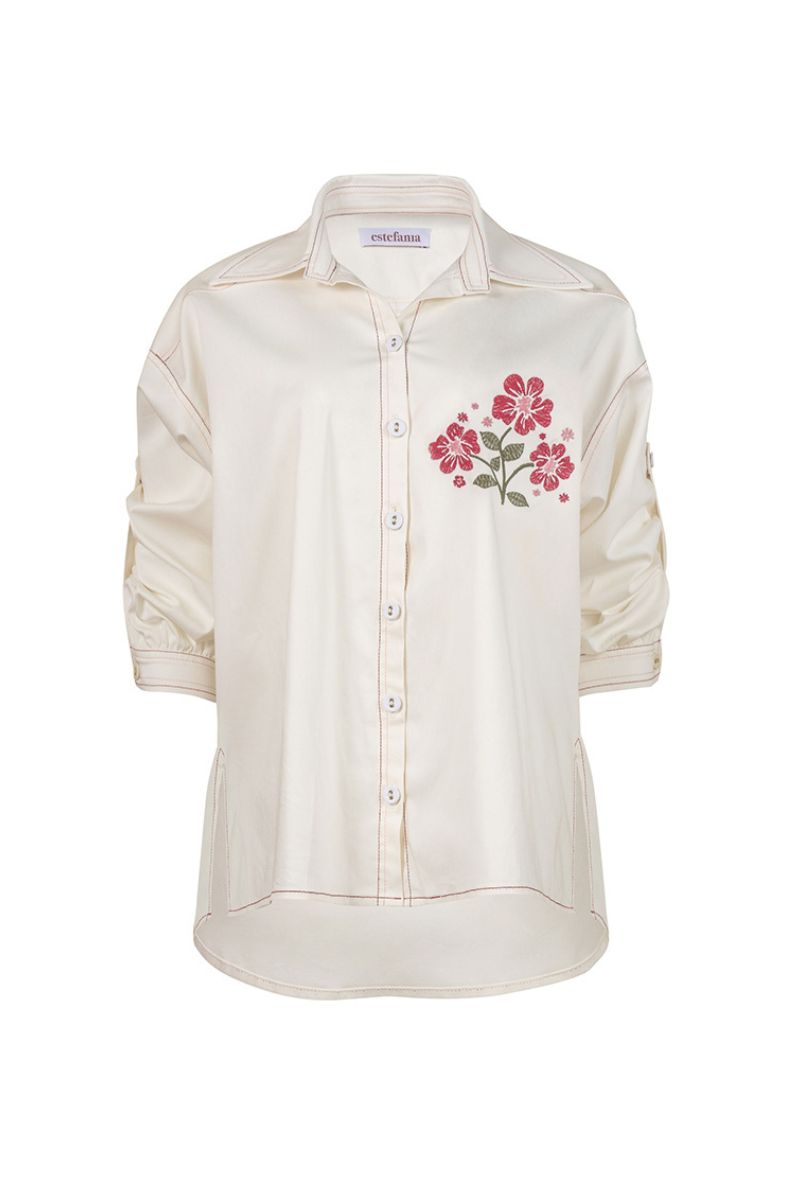 Estefania honey rose blouse with long sleeves and button front, showcasing soft fabric and stylish design.