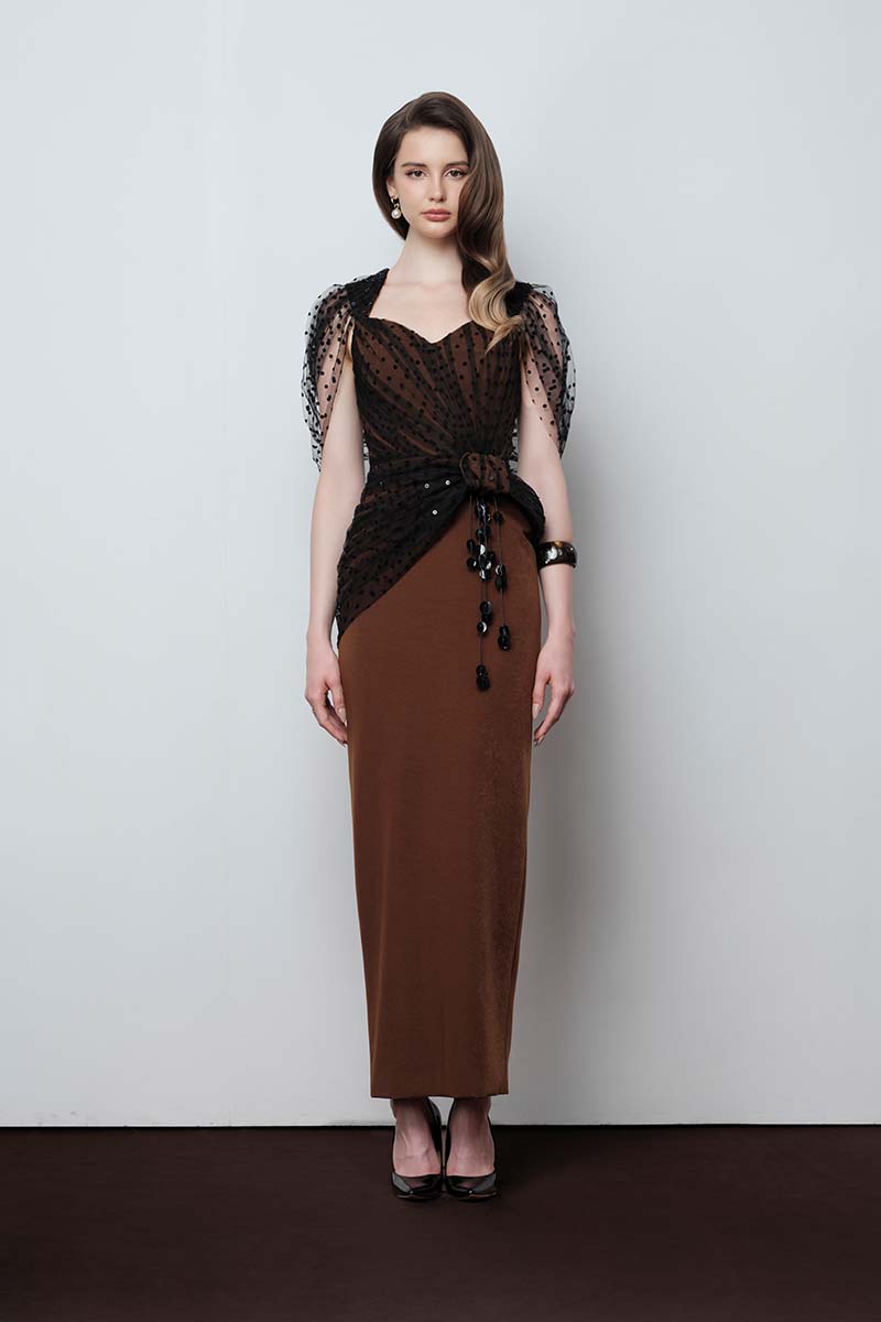 Elegant urban muse gown by Do Long featuring a flowing design with intricate details, perfect for formal occasions.