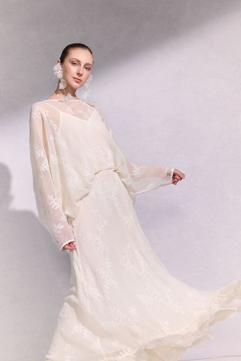 Arti Apparel Solara Maxi Dress in flowing fabric with a stylish design, perfect for casual or formal occasions.