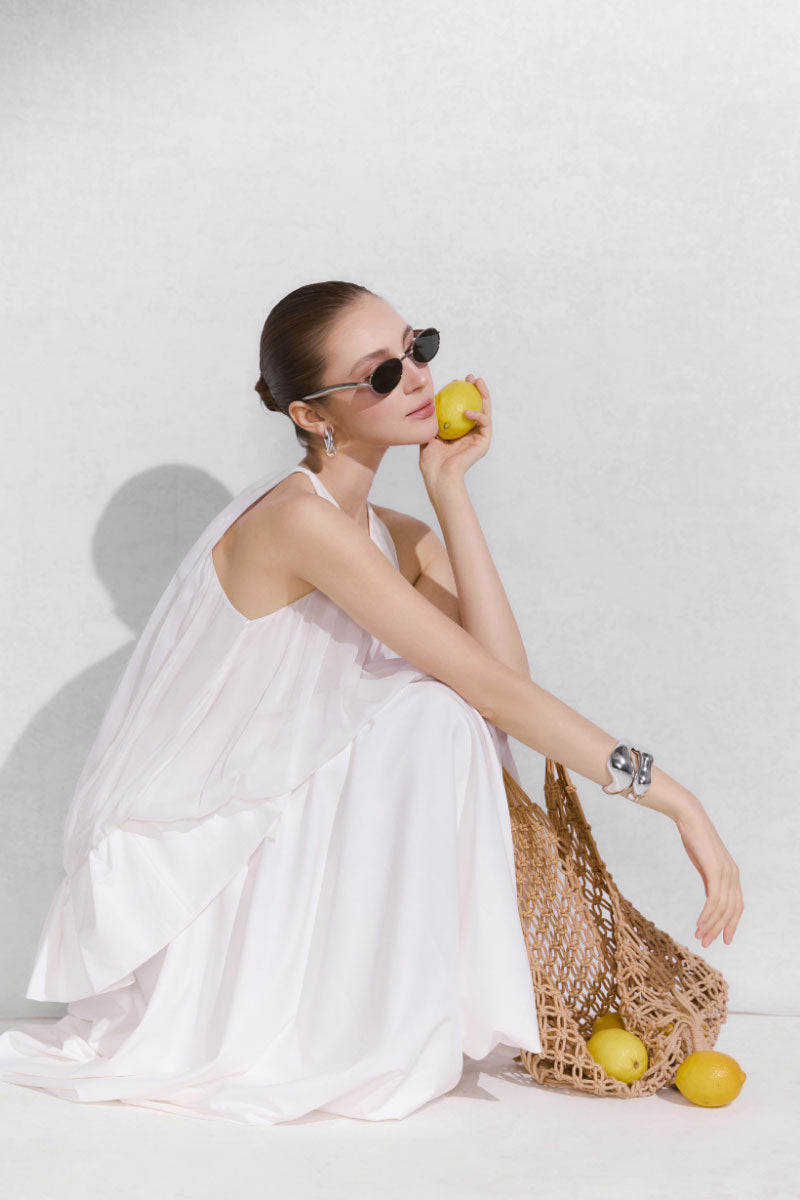 Arti Apparel MONETA TOP, stylish women's tops in a neutral color, shown on a model with a relaxed fit and soft fabric.