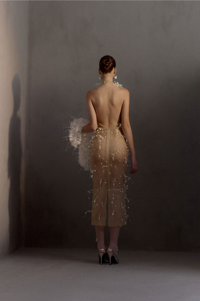 White Plan MALISTON gown, elegant long dress with flowing fabric and intricate detailing, perfect for formal occasions.
