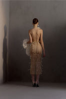 White Plan MALISTON gown, elegant long dress with flowing fabric and intricate detailing, perfect for formal occasions.