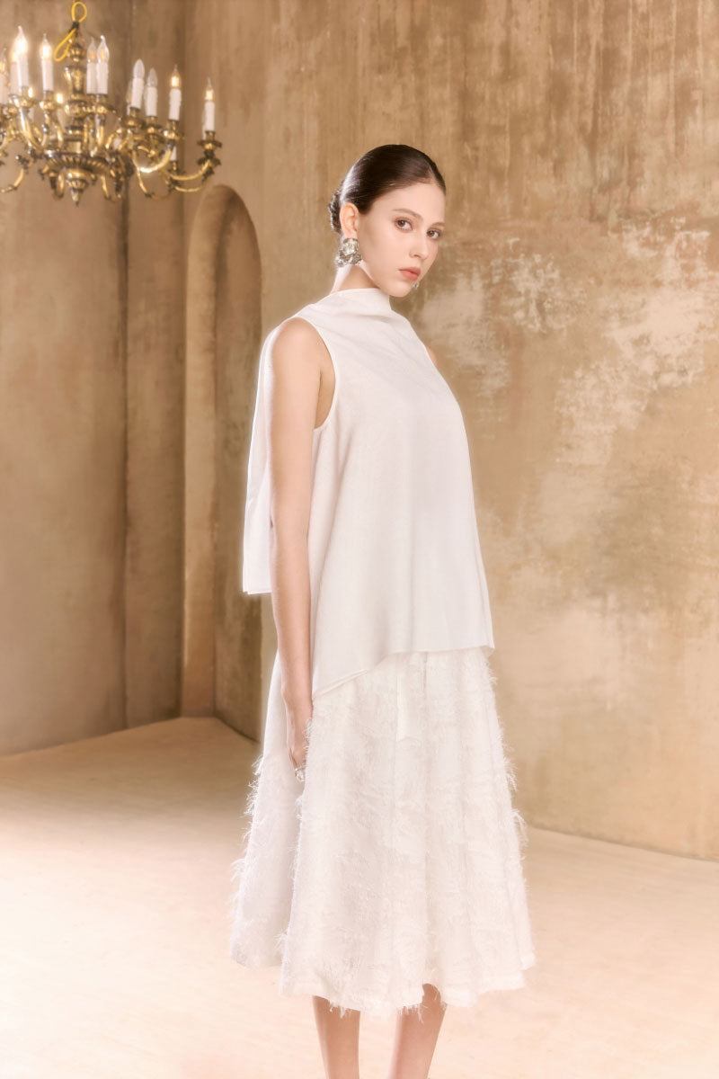 Arti Apparel Levi top showing a stylish sleeveless design with a fitted silhouette and subtle detailing.