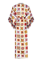 Nur Karaata JOALI Sicilia cover-up dress, lightweight and breezy beach cover-up with vibrant patterns and flowing fabric.