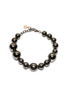 Silver YABA necklace by Silvia Gnecchi featuring a sleek, modern design with a polished finish.